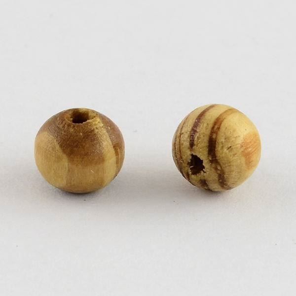 Perle (finte): 60 Perlen Holz gestreift 8mm – Nuovo (secondo la descrizione) da Alpnachstad venduto da perlengaby