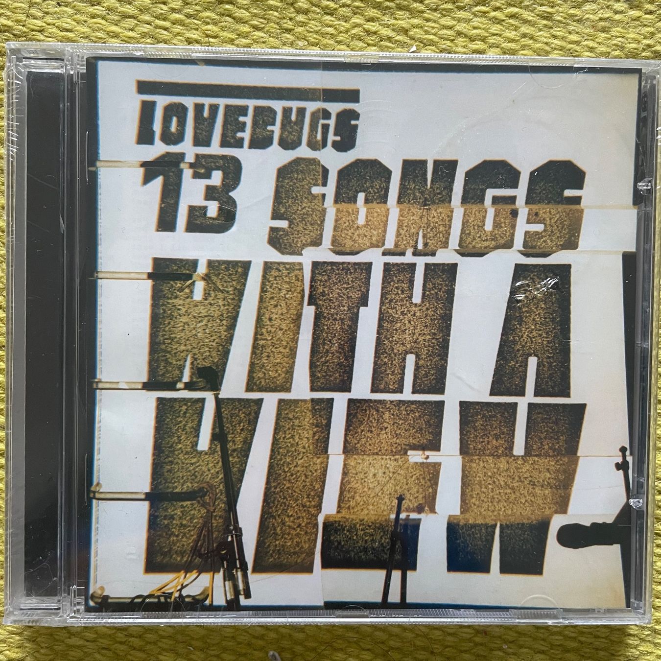 CD: LOVEBUGS-13 SONGS WITH A VIEW – Nuovo e nell'imballaggio originale da Rorschacherberg venduto da CD-Roli