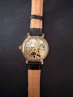 Neue Damenuhr, skelettiert, Gold, Lederarmband
