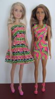 2 Barbie Puppen in Sommerkleidern