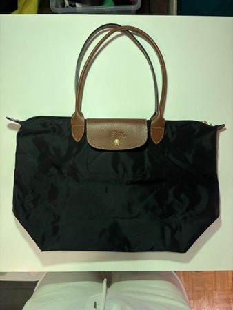 Schwarze Longchamp Le Pliage Tasche