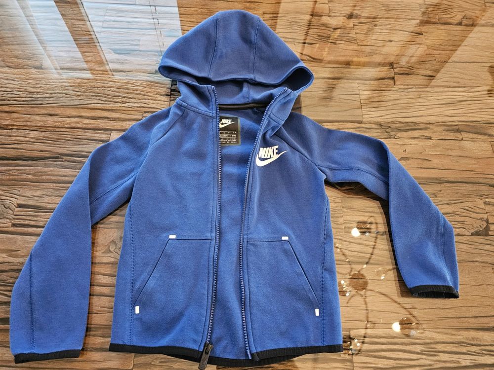 Nike Giacche & Cappotti: Nike Übergangs Jacke, Grösse 104-110, Top Zustand, Blau! – Usato da Birr venduto da V-K