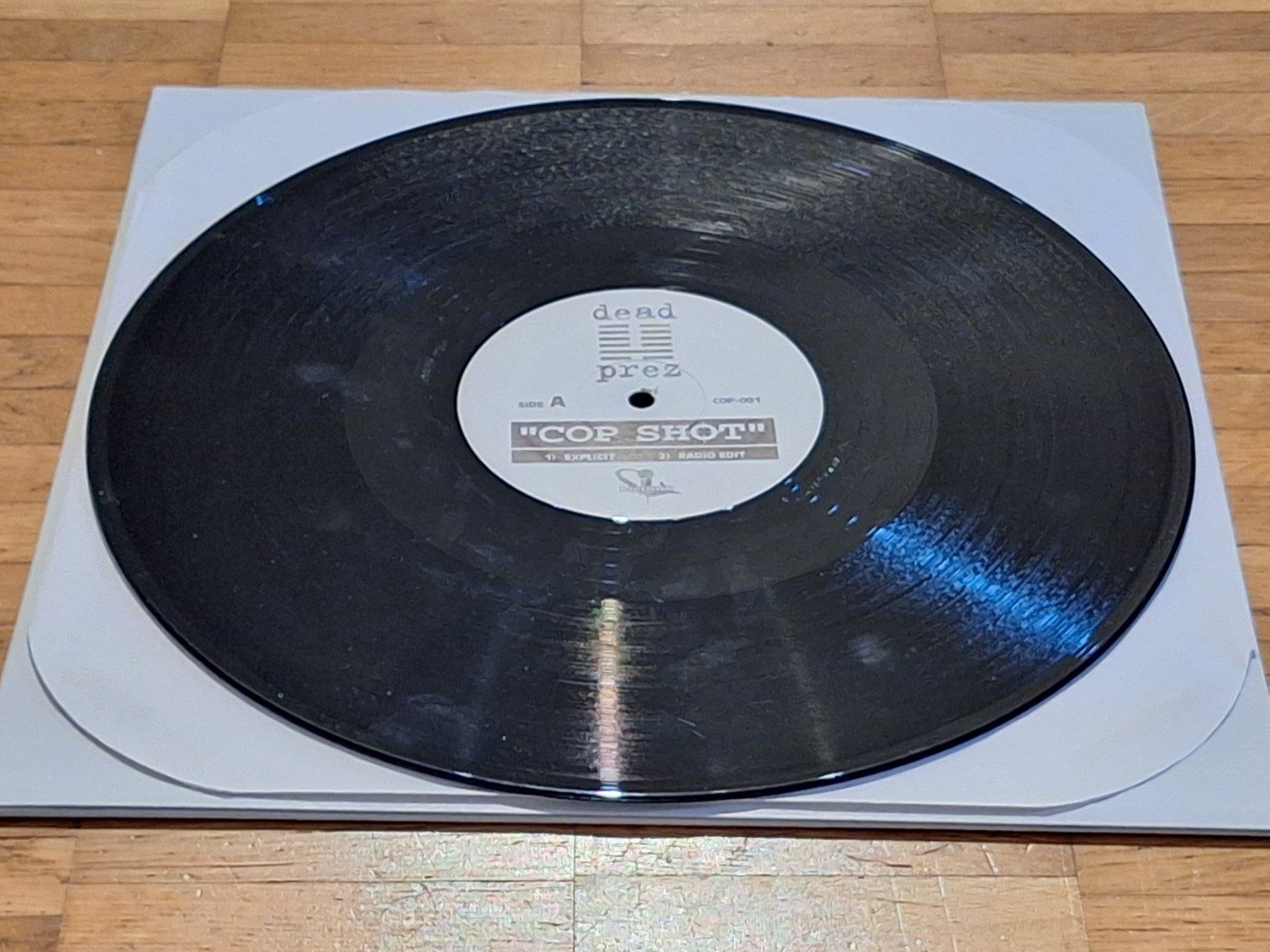 Dischi in vinile: dead prez, Cop Shot - 12" Maxi USA 2000 – Nuovo (secondo la descrizione) da Oberentfelden venduto da Musicud 2