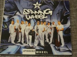 SPINNING WHEEL CD — 10 Hits! —