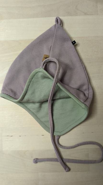 Bonnets & Echarpes: PurePure Zipfel Bindemütze mauve 47 – D'occasion à Zürich par albalm