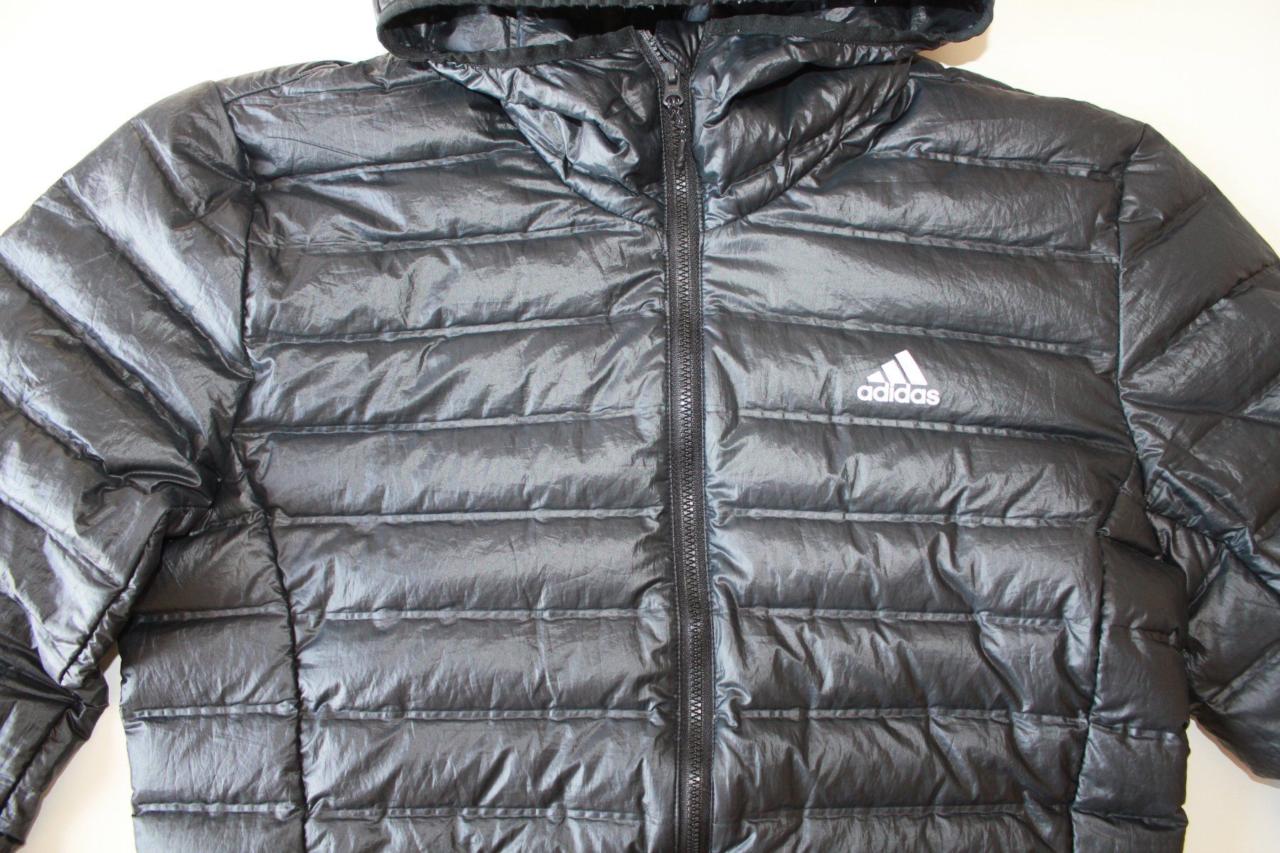 Adidas Jacken: Doudoune Adidas noire à capuche t. S – Gebraucht aus Peseux von Gilloss 2