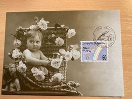 Süsse Vintage Postkarte, Baby im Blumenkorb, 1995 Vaduz L...