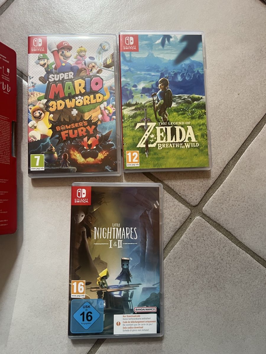 Nintendo Console: Quasiment neuve : Switch - Console de jeu avec trois jeux – Nuovo (secondo la descrizione) da Lugnorre venduto da cla_j6bq 1