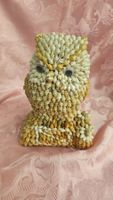 Statua gufo realizzata con conchigliette