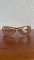 Lunettes de soleil Prada