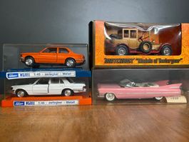 Lot an vier Modell Autos