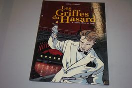 LES GRIFFES DU HASARD     °°°°°   ENTRE CHIEN ET LOUP  °°°°