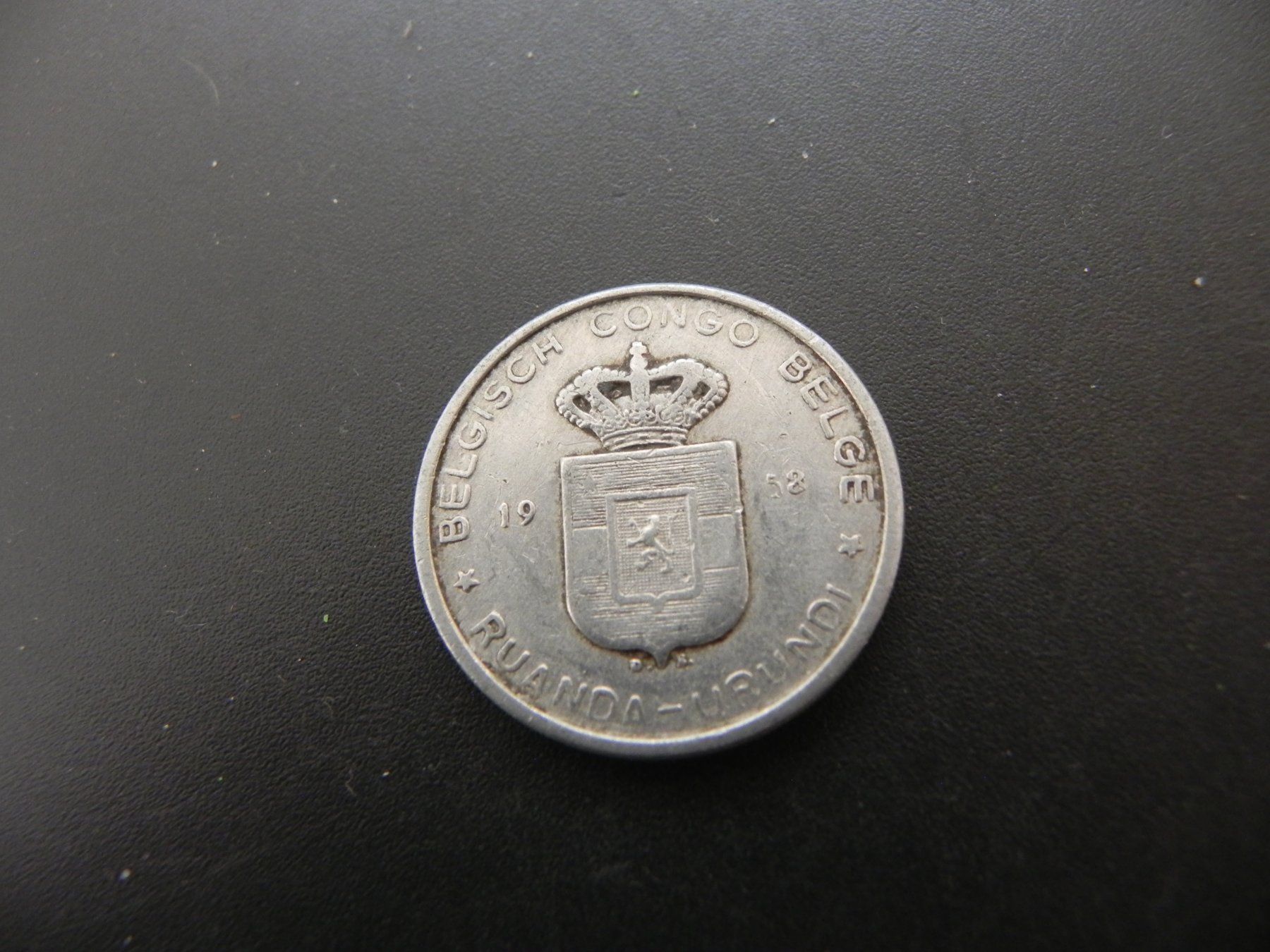 Tutti le monete: Belgisch Congo 5 Francs 1958 – Usato da Biel/Bienne venduto da Gogolozi
