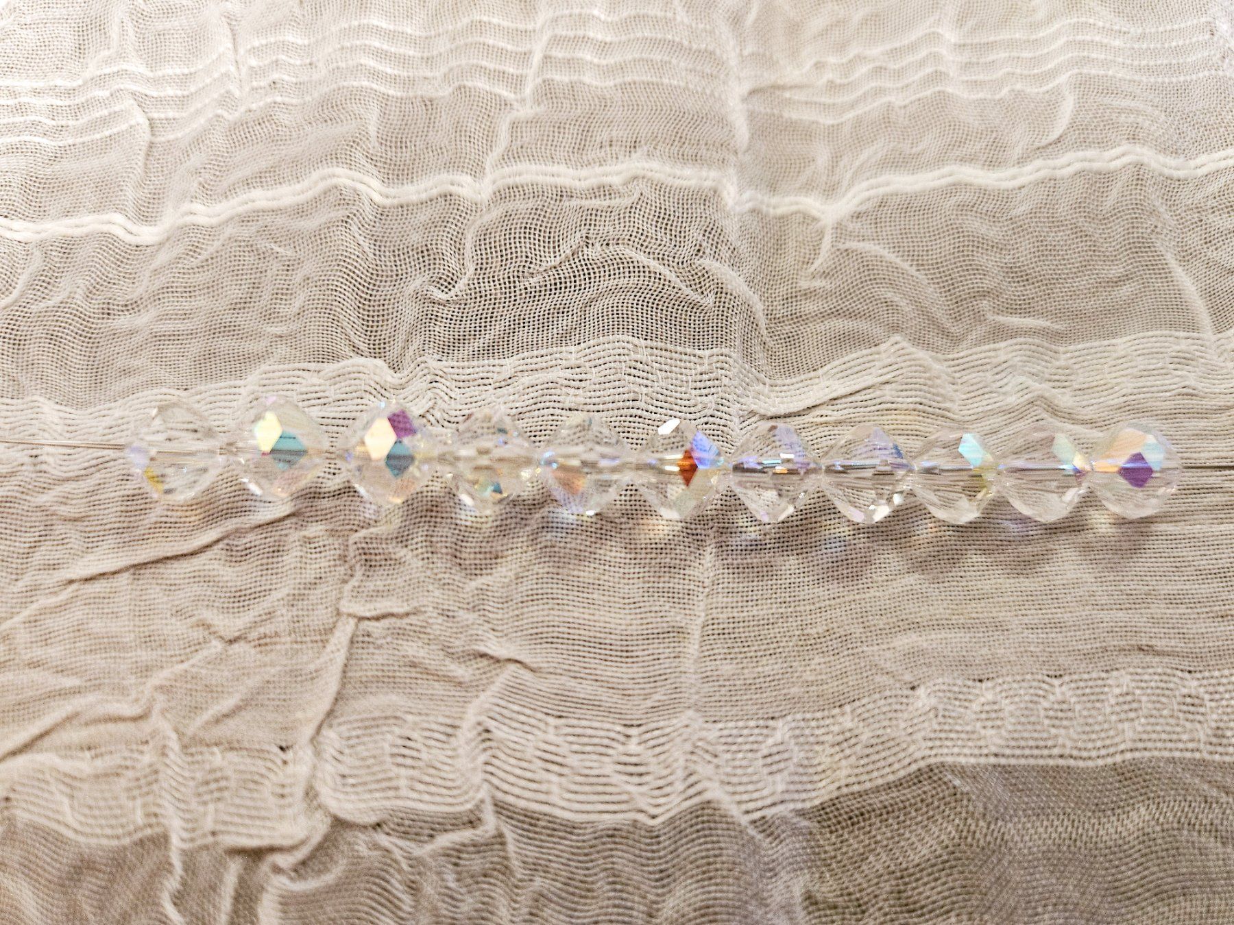 Perle (finte): Swarovski Perlen Crystal AB 6mm – Nuovo e nell'imballaggio originale da Dietikon venduto da Eleda 1