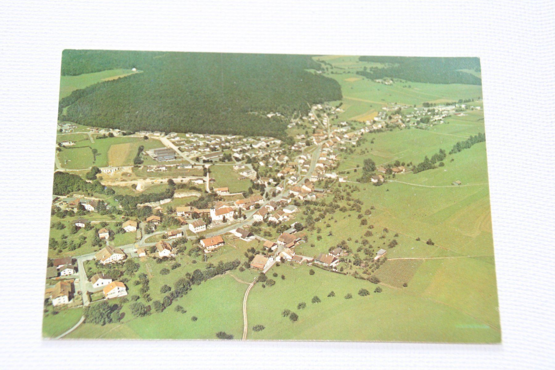 Cartoline postali: DEVELIER VUE AERIENNE 1 – Usato da Develier venduto da Syncope