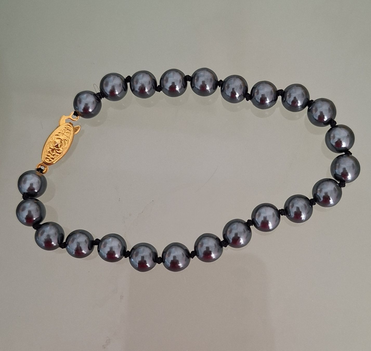 Bracelets: PERLENARMBAND Vergoldeter Verschluss – D'occasion à Kerzers par ExpressoTerreno