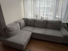 Ausziehbares Ecksofa grau mit Ottomane und Stauraum