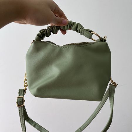 Elegant sage green scrunch handle bag from Primark with gold