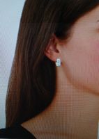 Boucles d'oreilles créoles en argent avec zircons