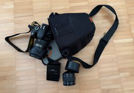 Nikon D5100 DSLR Kamera mit 18-200mm Objektiv und Tasche