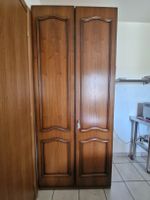 Armadio a due ante in legno massello