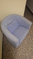 Fauteuil bleu avec son coussin