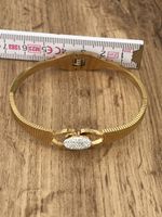 Goldener Armreif mit Strass-Stein – Eleganter Hingucker!