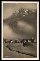 AK Göscheneralp, Ort mit Kirche und Bergmassiv