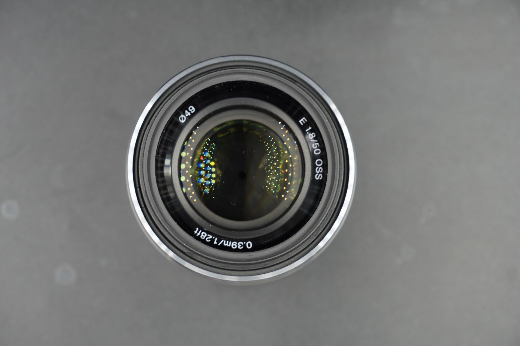 Sony Objektive: Objektiv Sony E 1.8/50 OSS SEL50F18 silber gebraucht APSC – Gebraucht aus Niederhasli von Adrianson 8