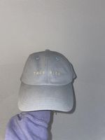 hellblaue Cap ‚très bien‘
