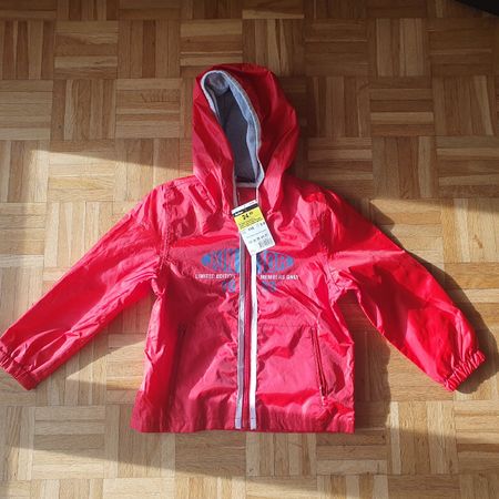 neue Minikids Regenjacke von Coop mit Etikette