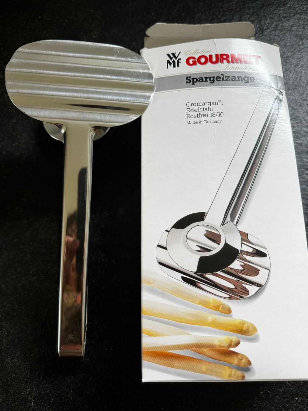 WMF Elettrodomestici da cucina: Neuware Spargelzange WMF Edelstahl – Nuovo e nell'imballaggio originale da Kirchdorf AG venduto da coco123 1