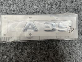Mercedes-Benz A35 AMG Logo - Neu, Originalteil A1778175300