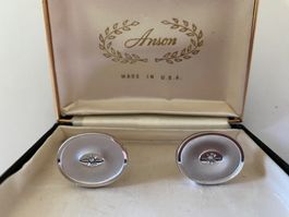 Boutons de manchettes argentés