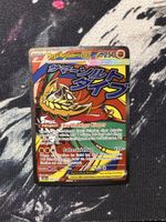 Pokémon Mega-Resladero ex – Gebraucht / mit Gebrauchsspuren