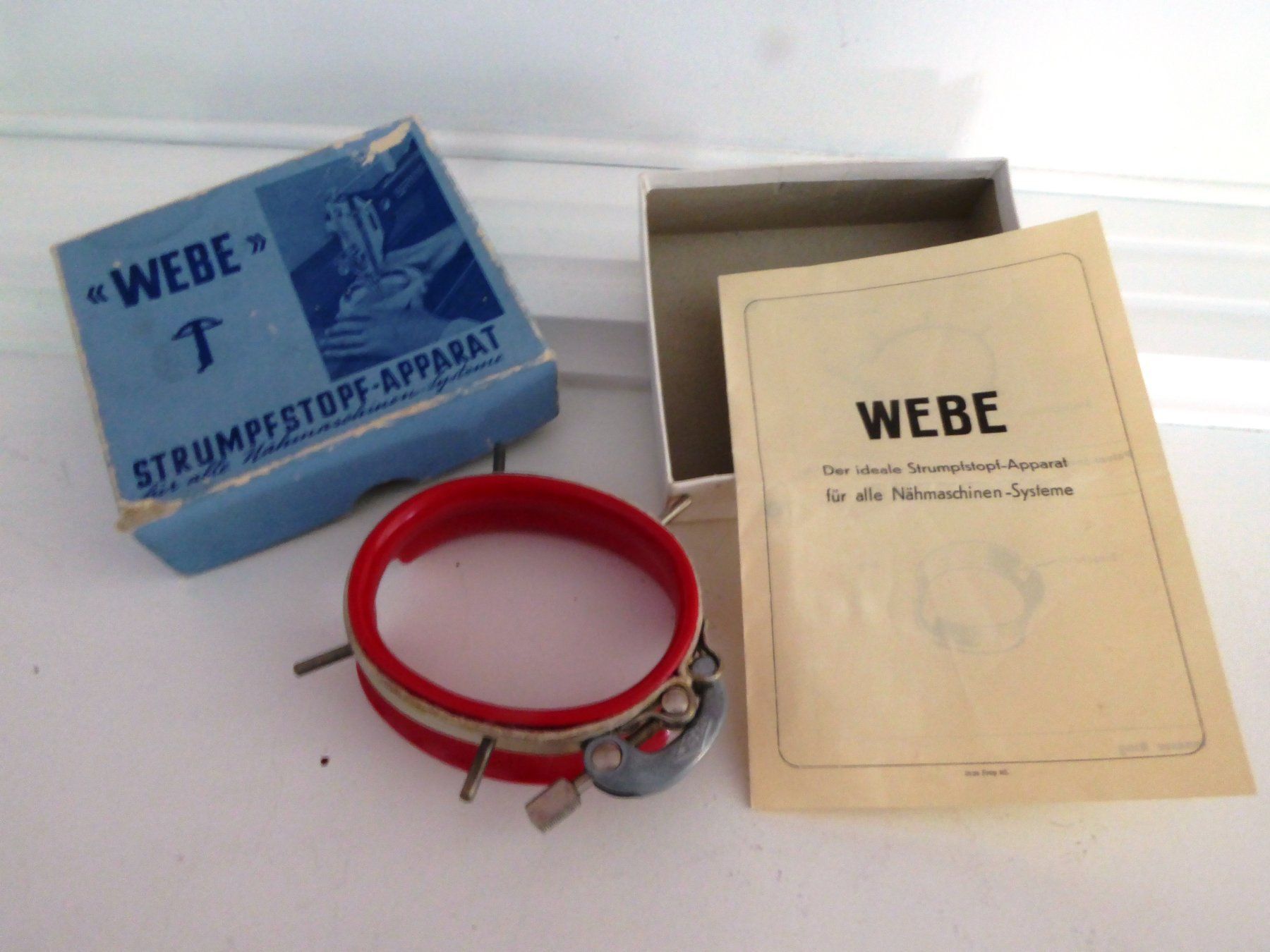 Cerchi da ricamo: WEBE Strumpfstopf-Apparat CH original Armbrustzeichen OVP – Usato da Burgdorf venduto da Zimpu10
