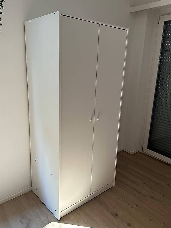 Armadi: Armadio bianco con ante. – Nuovo e nell'imballaggio originale da Massagno venduto da bra_n9zx 1