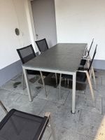 Granittisch mit Edelstahl, 5 Zumsteg- Stühle