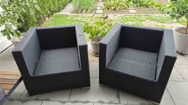 2 Rattan Gartenstühle schwarz gebrauchter Zustand