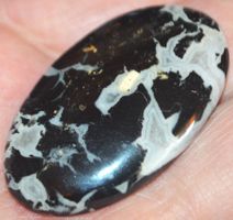 Cabochon L-3774 – Schwarzer Crazy Lace Achat 42x25mm