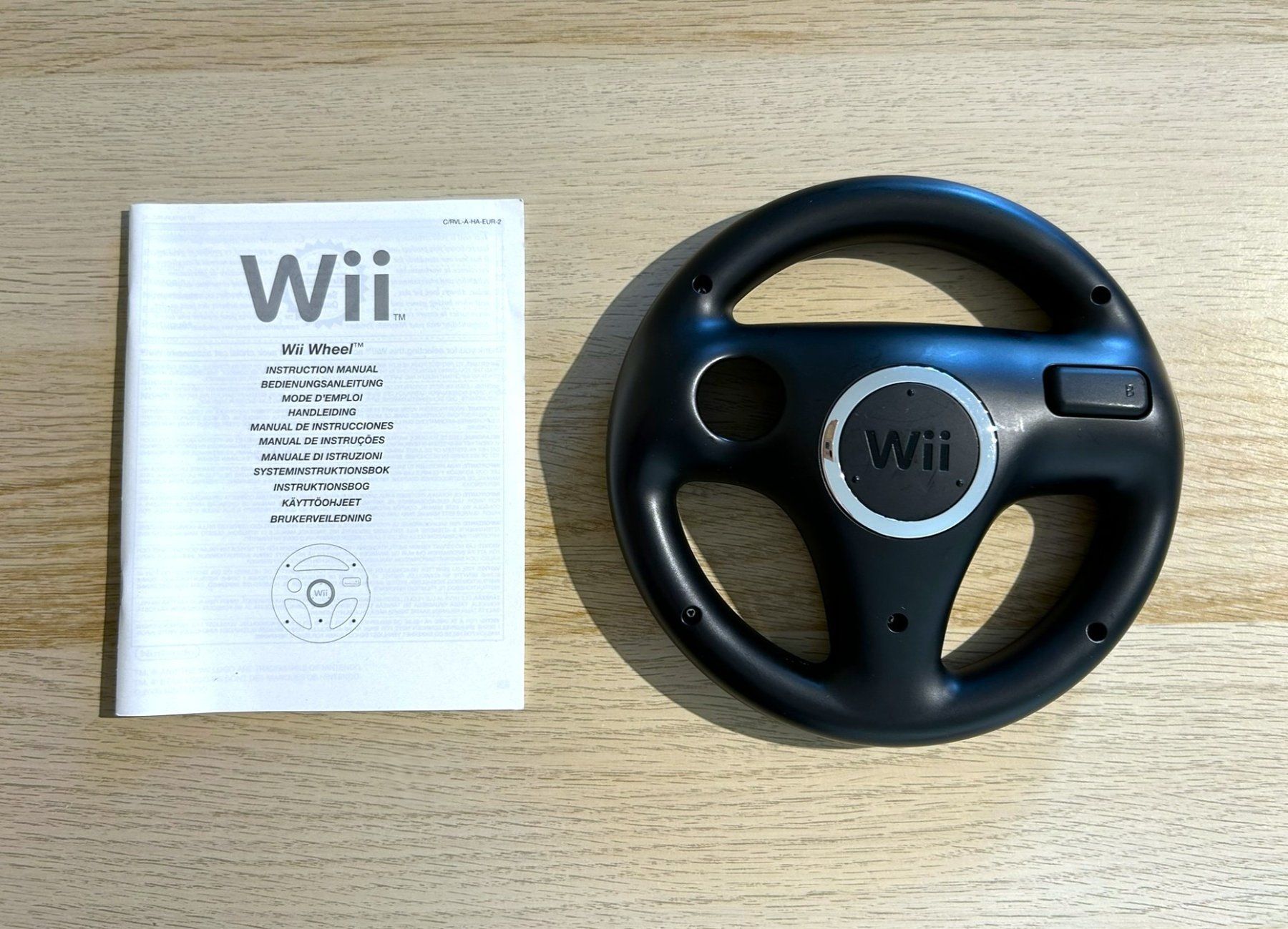 Nintendo Controller: Nintendo Wii Lenkrad Schwarz mit Anleitung – Gebraucht aus St. Gallen von Alpine.Arcade