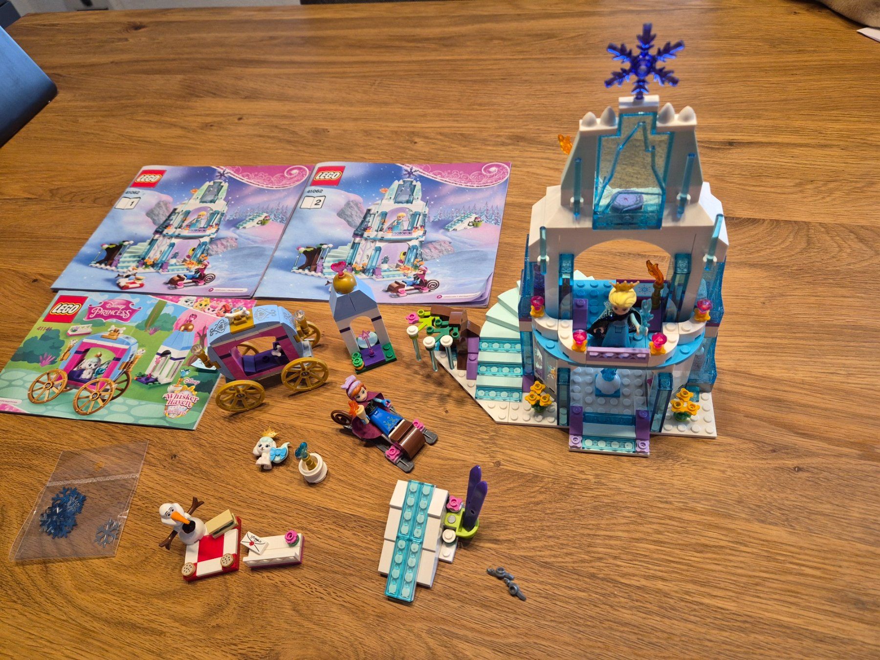 Lego Spielzeuge: Lego Disney Princess 41062 + 41141 Eispalast + Kutsche – Gebraucht aus Leimbach TG von lachende