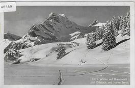 Winter auf Braunwald mit Ortstock und hoher Turm