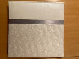 Fotoalbum mit Seidenband, creme-weiss, ungebraucht.