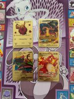 4 mal Pokémon Metallkarten