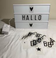 Leuchtbox mit Buchstaben und Netzteil