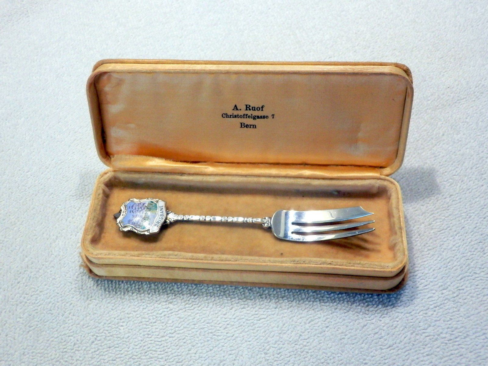 Forchette: Souvenir Dessertgabel, aus Brisbane emailliert / versilbert – Usato da Ueberstorf venduto da dinbau
