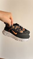Nike Kinderschuhe schwarz orange Grösse 22