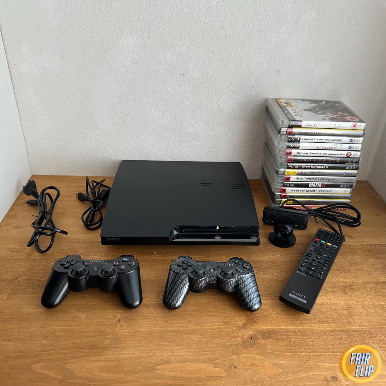 Sony Console: Sony Playstation 3 mit Spielen & 2 Controller – Usato da Luzern venduto da fairflip