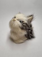Katze sitzend klein Echtfell
